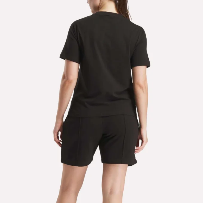 Camiseta de manga corta con cuello redondo y logotipo grande para mujer