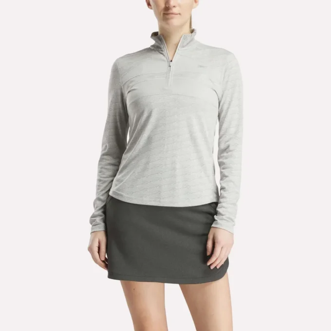Jersey de golf de manga larga con cremallera 1/4 y tejido jacquard Vector para mujer Jersey de golf de manga larga con cremallera 1/4 y tejido jacquard Vector para mujer