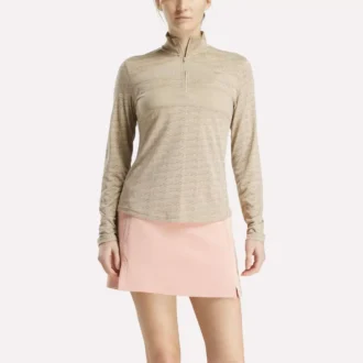 Jersey de golf de manga larga con cremallera 1/4 y tejido jacquard Vector para mujer
