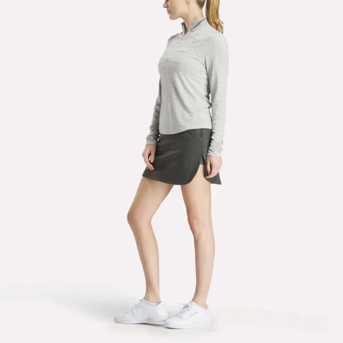 Jersey de golf de manga larga con cremallera 1/4 y tejido jacquard Vector para mujer Jersey de golf de manga larga con cremallera 1/4 y tejido jacquard Vector para mujer