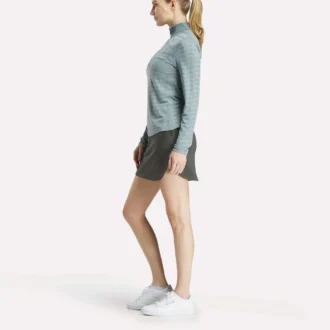 Jersey de golf de manga larga con cremallera 1/4 y tejido jacquard Vector para mujer