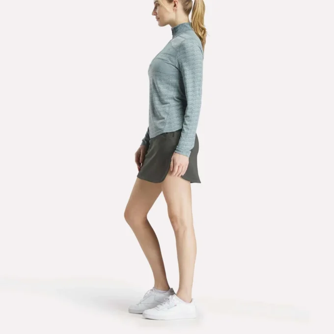 Jersey de golf de manga larga con cremallera 1/4 y tejido jacquard Vector para mujer Jersey de golf de manga larga con cremallera 1/4 y tejido jacquard Vector para mujer