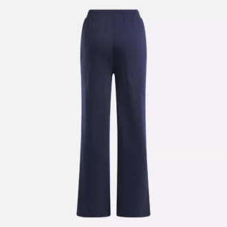 Pantalones anchos de felpa con pequeño logotipo Reebok Identity para mujer