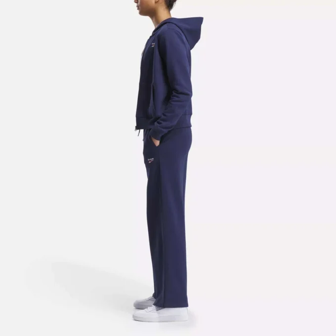 Pantalones anchos de felpa con pequeño logotipo Reebok Identity para mujer