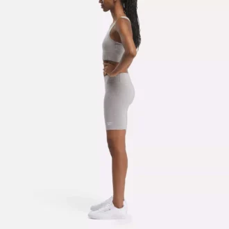 Pantalones cortos de ciclista de algodón con logotipo pequeño Reebok Identity para mujer, 18 cm