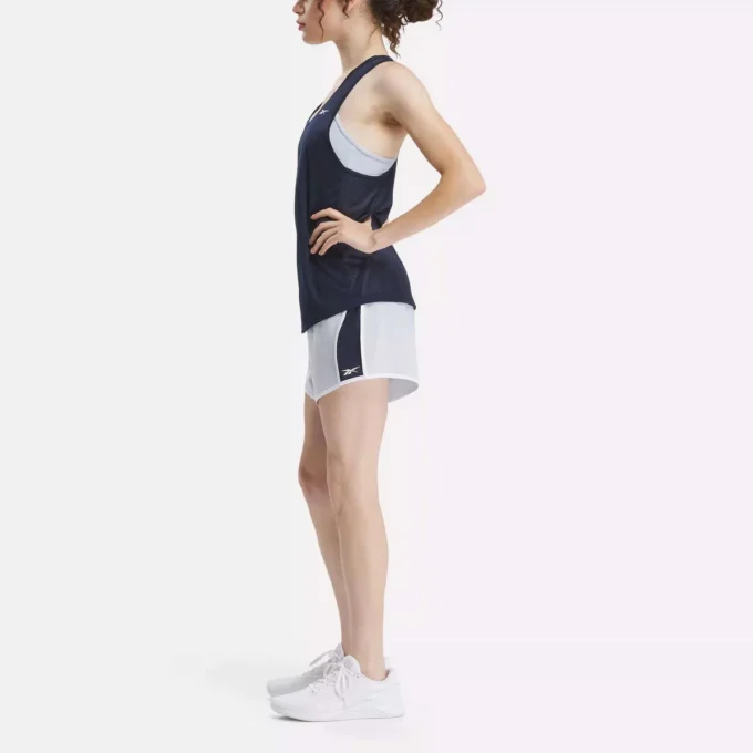 Pantalones cortos tejidos ID Train para mujer