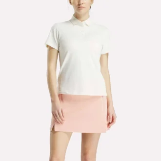 Polo de manga corta con tapeta de piqué elástico para mujer