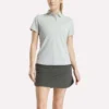 Polo de manga corta con tapeta de piqué elástico para mujer