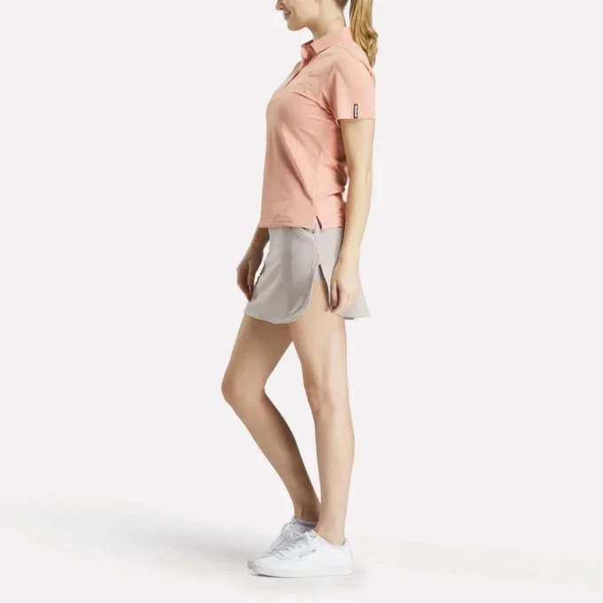 Polo de manga corta con tapeta de piqué elástico para mujer Polo de manga corta con tapeta de piqué elástico para mujer