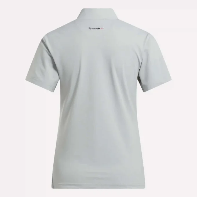 Polo de manga corta con tapeta de piqué elástico para mujer