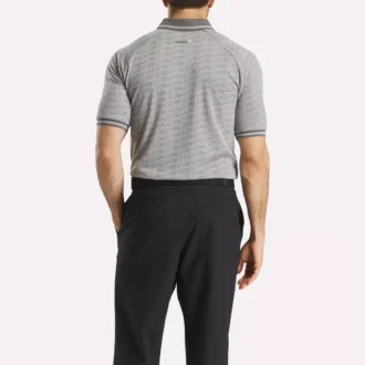 Polo de manga corta para hombre con jacquard Vector tonal y ribete acanalado